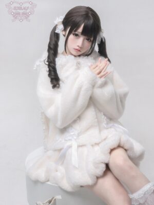 Back view of white artificial fur Jirai Kei bunny coat outfit with ruffled hem skirt and satin waist sash on seated model with black curly hair