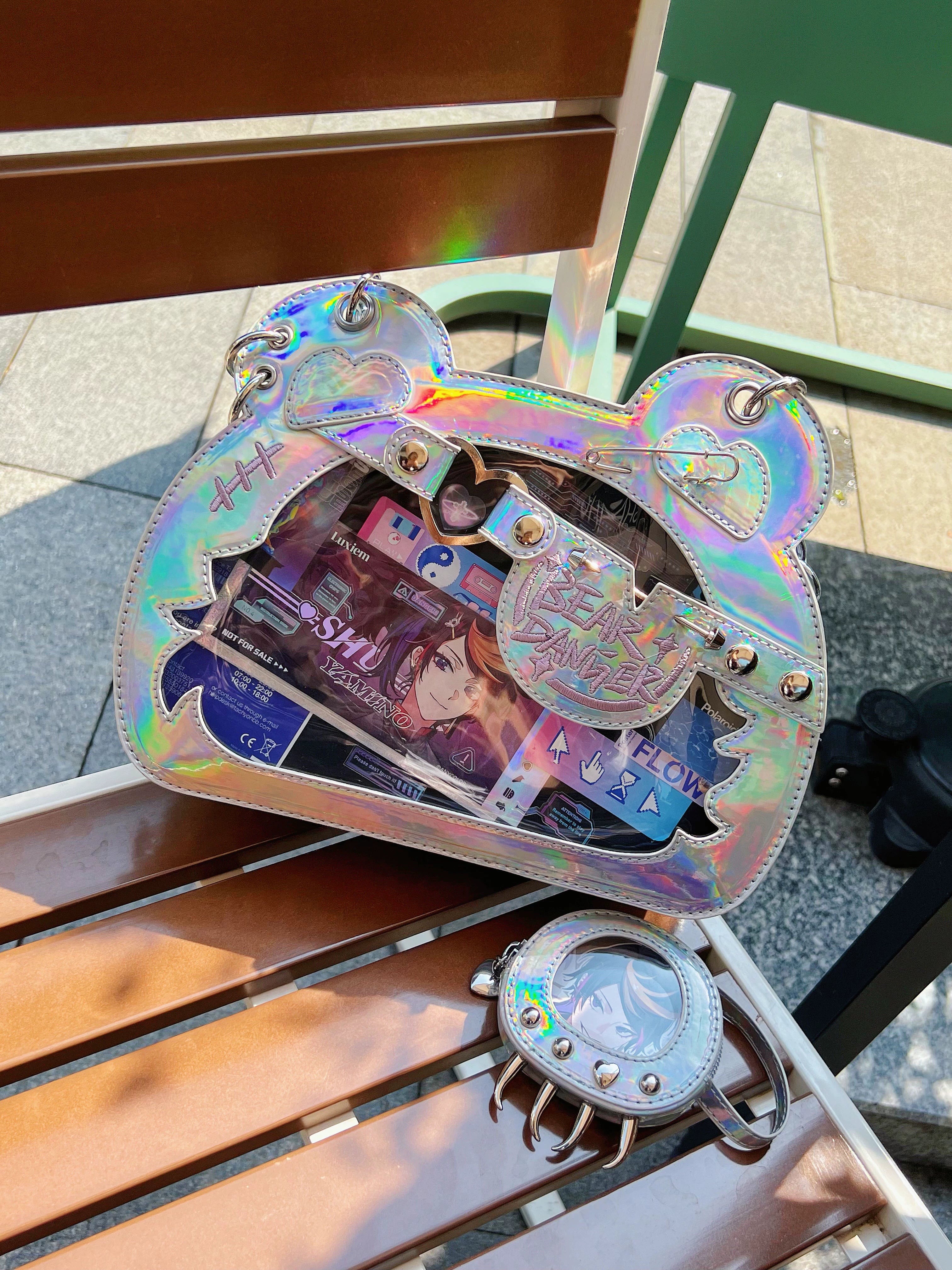 Multiple color variations of bear-shaped jirai kei ita bag collection, showcasing 10 colorway options from black to pink