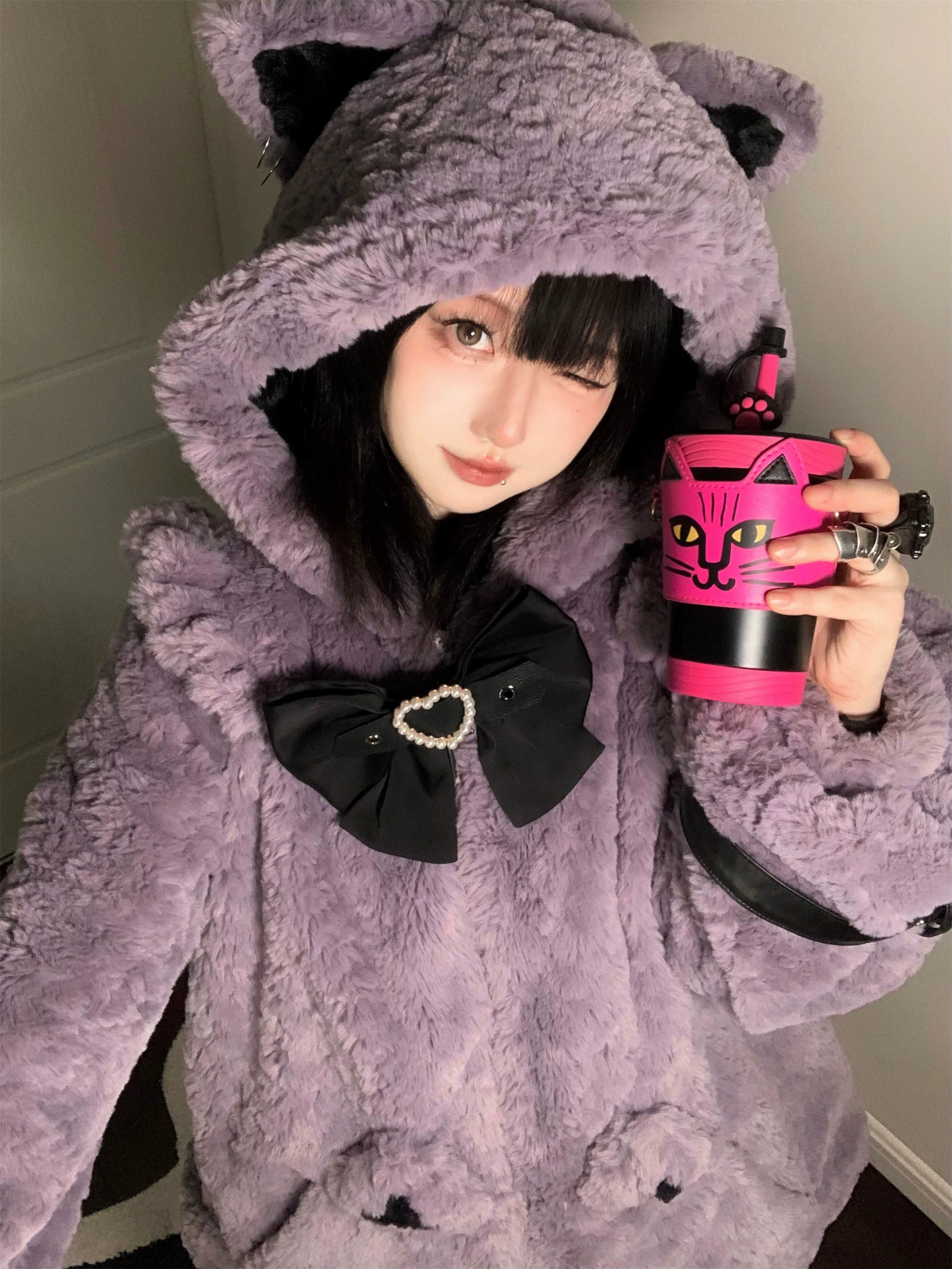 Jirai Kei fleece coat care tag and fiber content information, showing artificial plush fabric, acetate satin accents, and washing instructions