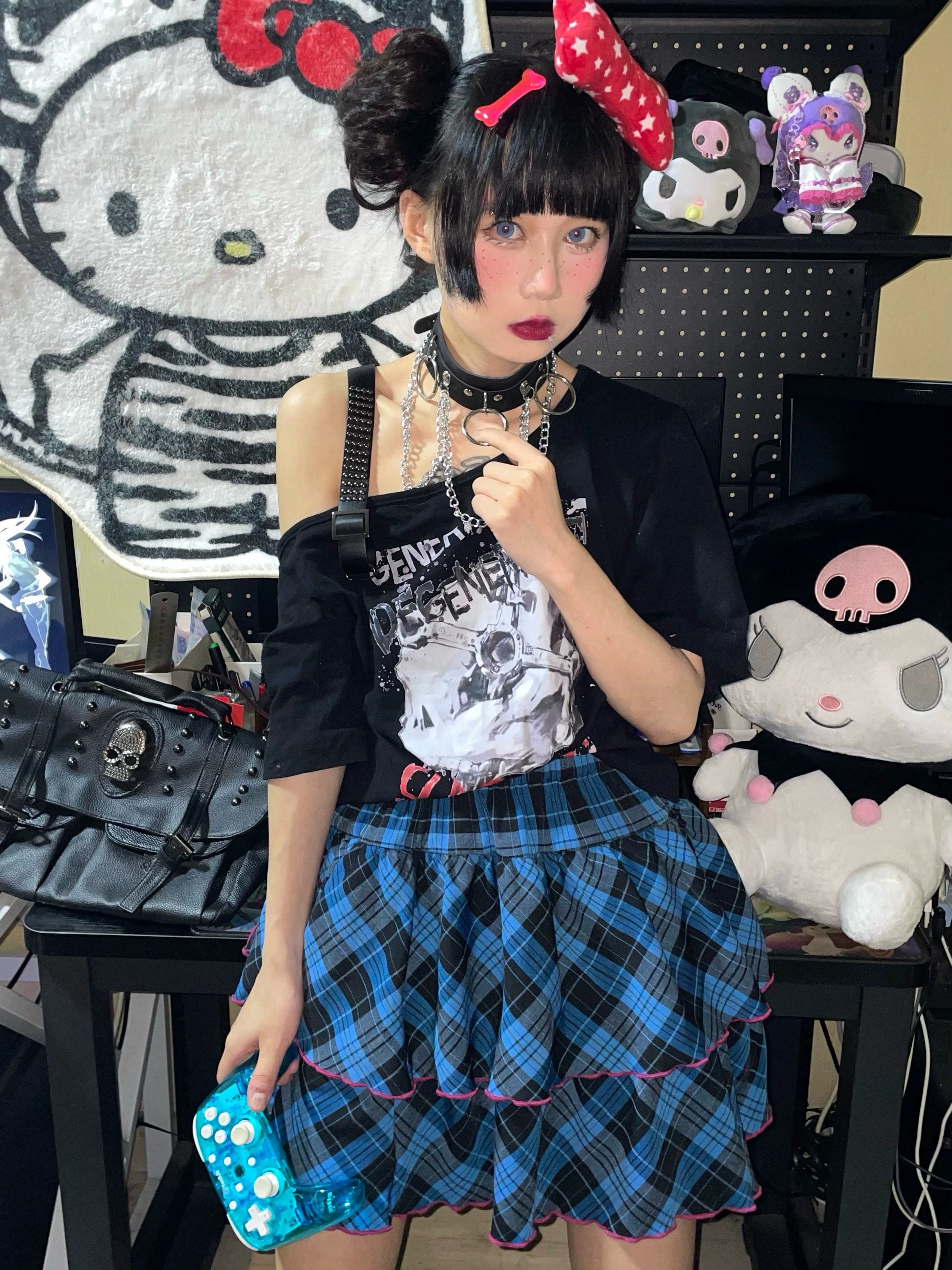 Pink-black plaid Jirai Kei ruffle mini skirt Harajuku fashion inspiration, alternative style coordination, goth punk ensemble