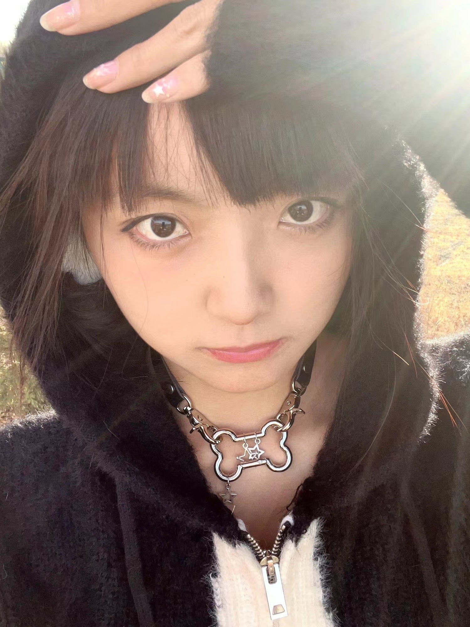 Black Jirai Kei punk choker featuring hollow star and spike metal hardware on adjustable PU leather strap