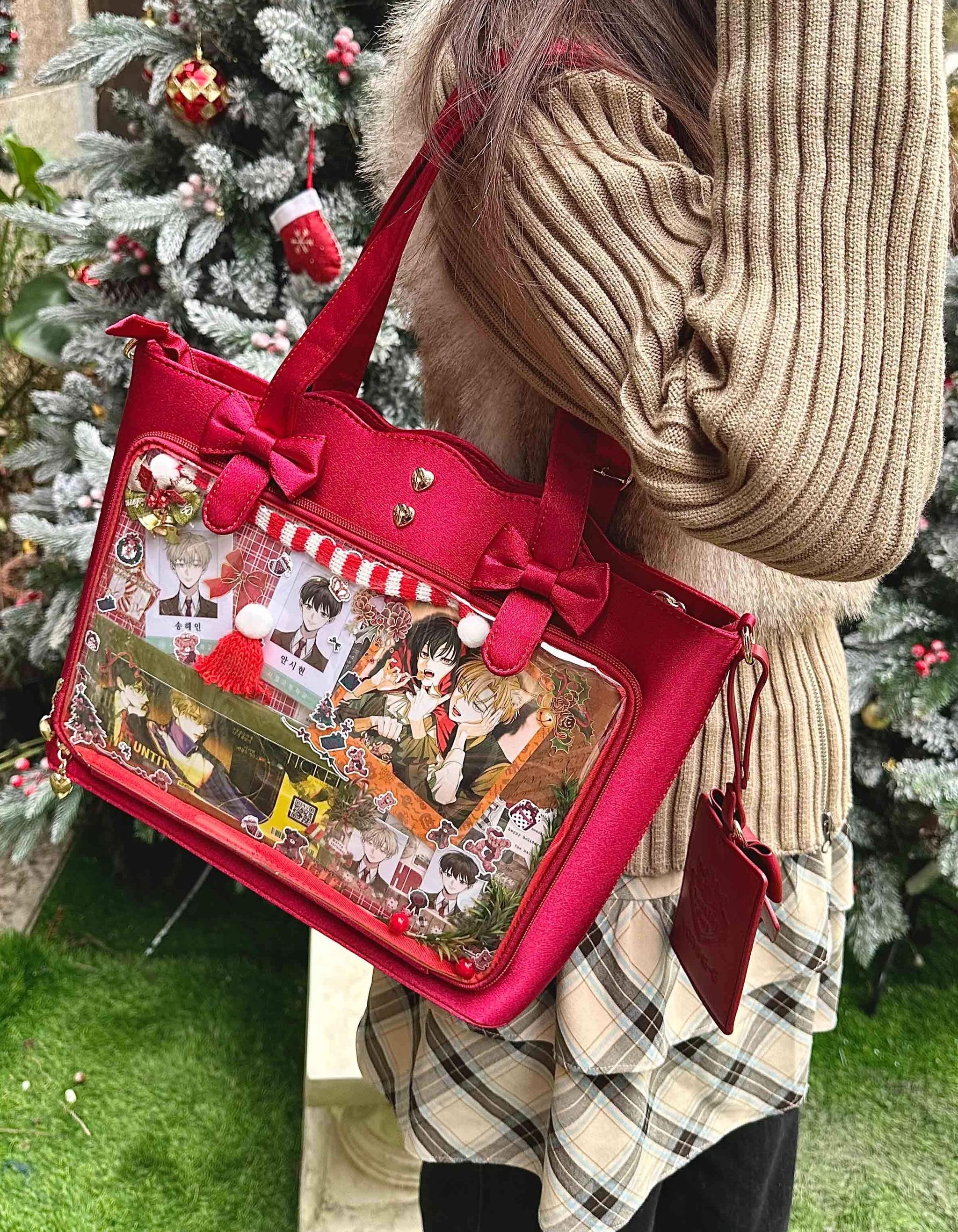 Jirai Kei ita bag removable bow-adorned shoulder strap detail view, showing adjustable metal buckle mechanism, quality PU leather construction, and dual carrying versatility for crossbody or handheld use