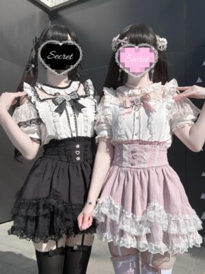 Front three-quarter view of petal-hem Jirai Kei skirt with dual color options and multi-layer lace ruffled hem on model