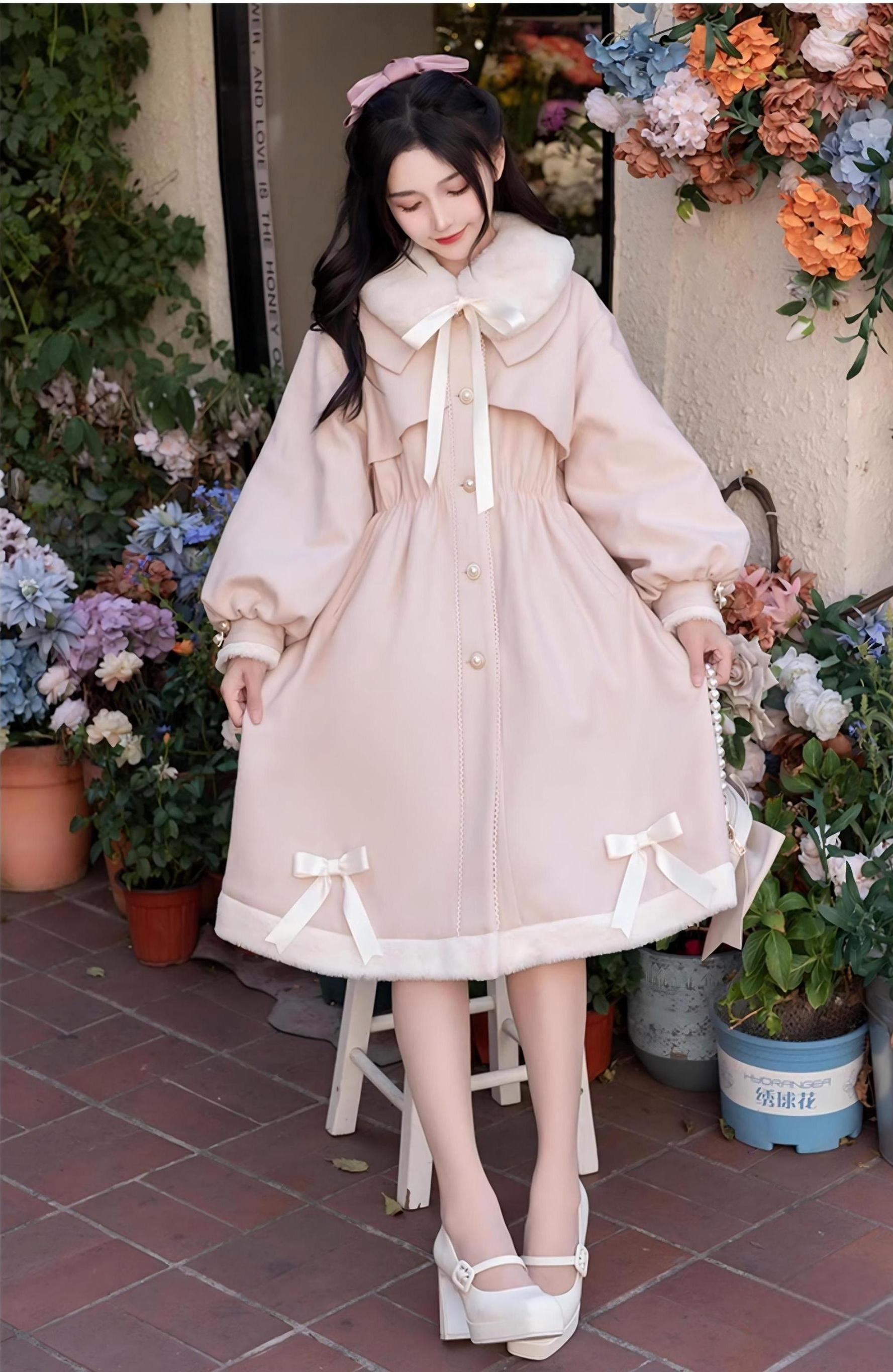 Light pink Ryousangata Jirai Kei winter coat back view - girl carrying bow handbag wearing pink coat with hem bow trims, lantern sleeves, and mid-long length silhouette