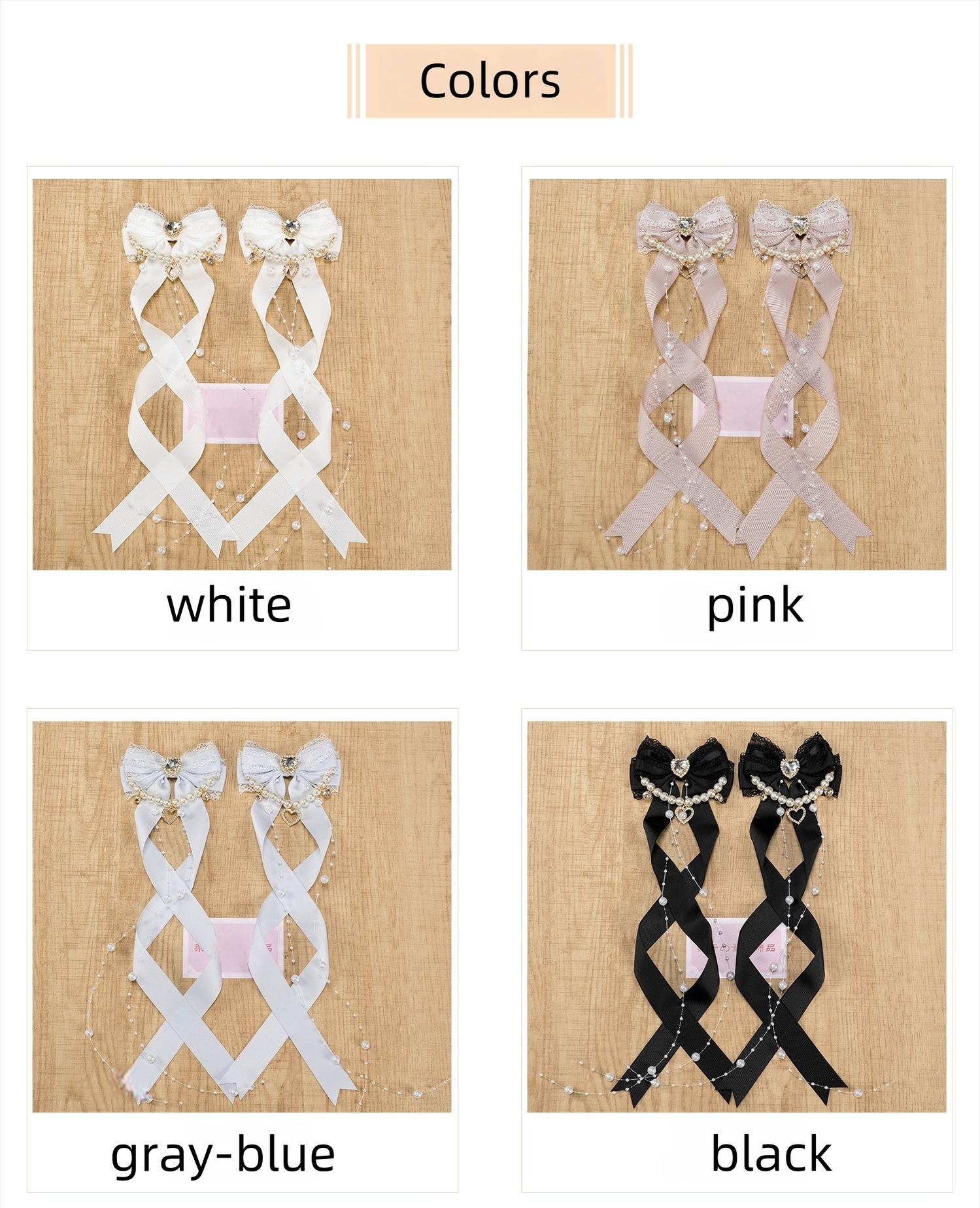Jirai Kei hair clip color sample collection showing white black pink and gray-blue bow clips with ribbon fabric and pearl chain details flat lay top view