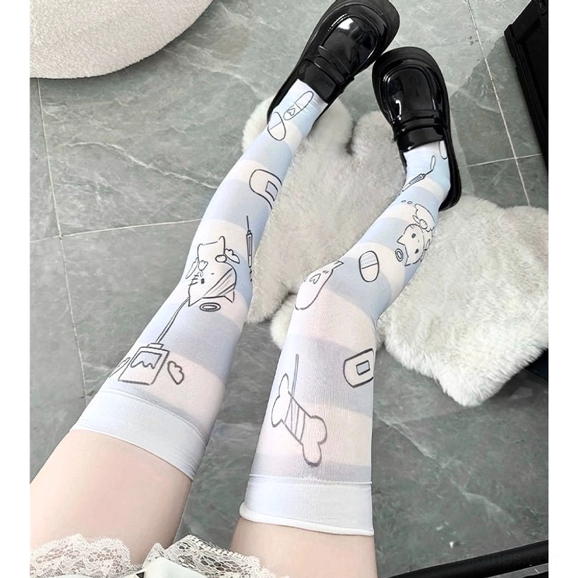 Angel over-the-knee socks with plain elastic thigh band and pale blue printed details, front view on female legs wearing black loafers, casual Jirai Kei look