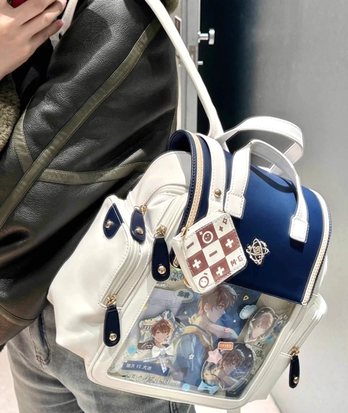 Anime merchandise organization system inside Jirai Kei itabag backpack showing internal compartment design