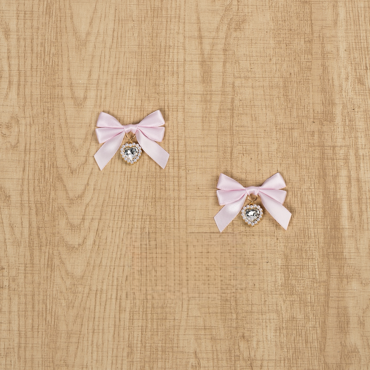 Pink Jirai Kei rhinestone pendant bow hair clips delicate ribbon design fashion accessory detail photography