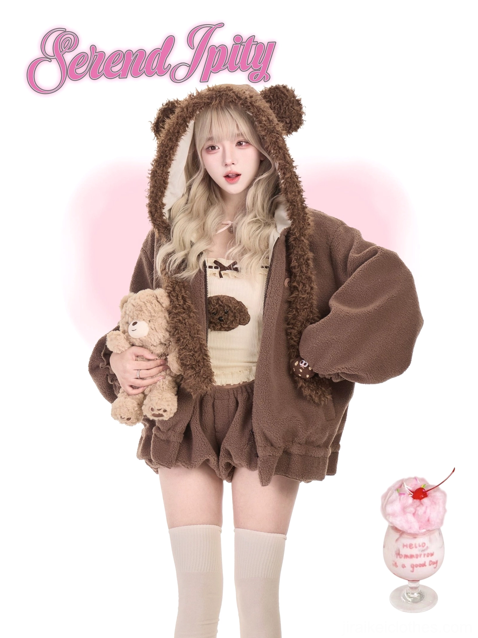 Front full-body view of bear ear Jirai Kei fleece loungewear set featuring brown fuzzy hoodie with bear ears, cream camisole with bear embellishment, brown bubble shorts, model holding plush teddy against pink heart background