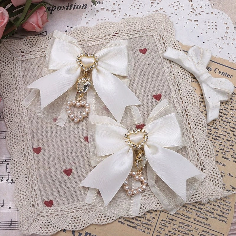 Beige bow hair clip pair with heart-shaped rhinestones and pearl embellishments - neutral Jirai Kei accessory