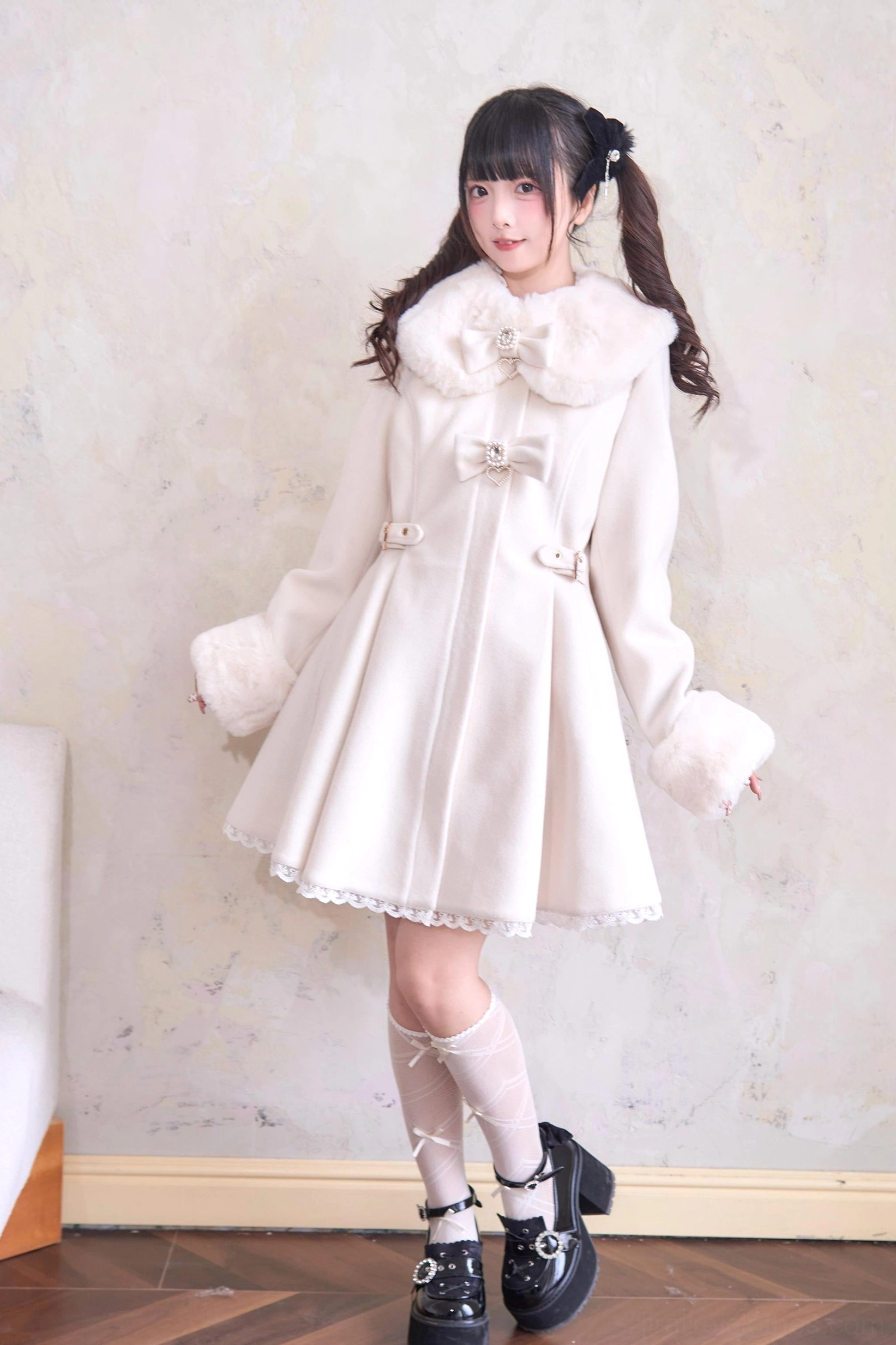 Beige Ivory Landmine Winter Coat with White Fur Trim and Lace Accents - A-Line Silhouette Three-Quarter View