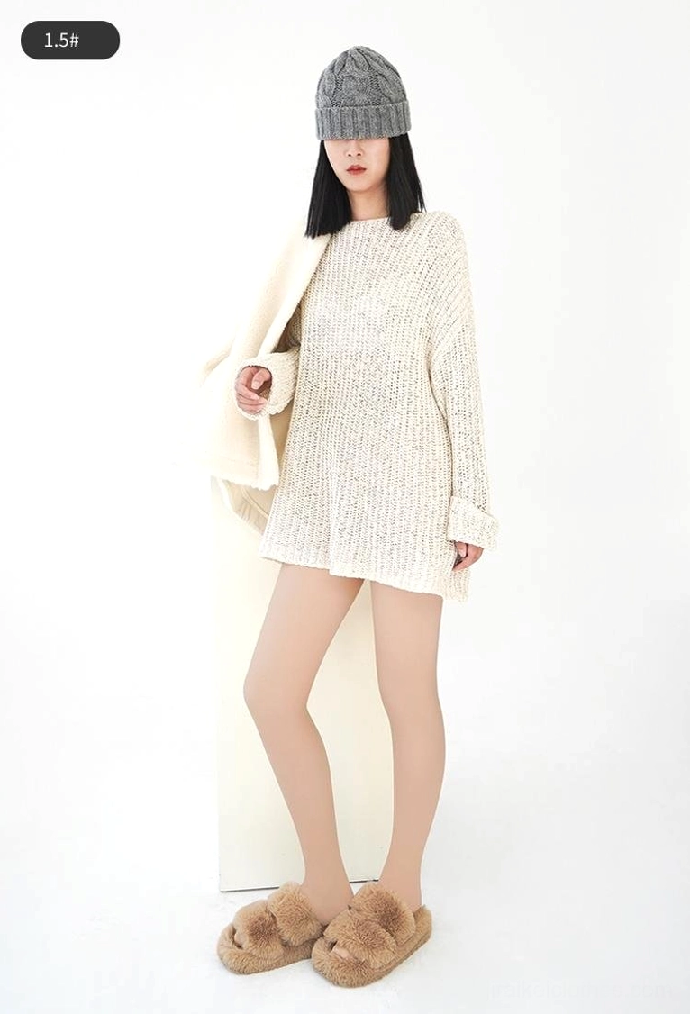 Full-body standing shot of model wearing beige velvet tights with knit dress, black beanie and coat - studio white background demonstrating daily wear versatility