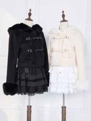 Black and beige hooded rousangata coats on mannequins, studio flat frontal view displaying fur-lined hoods, plush cuffs, and bow details, paired with coordinating ruffle skirts for jirai kei styling