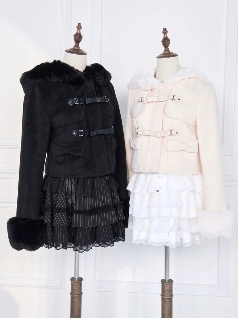 Black and beige hooded rousangata coats on mannequins, studio flat frontal view displaying fur-lined hoods, plush cuffs, and bow details, paired with coordinating ruffle skirts for jirai kei styling