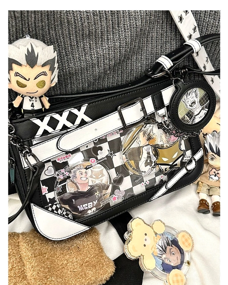 Black and blue Jirai Kei ita bag with adjustable strap highlighting cool-toned anime character badge showcase