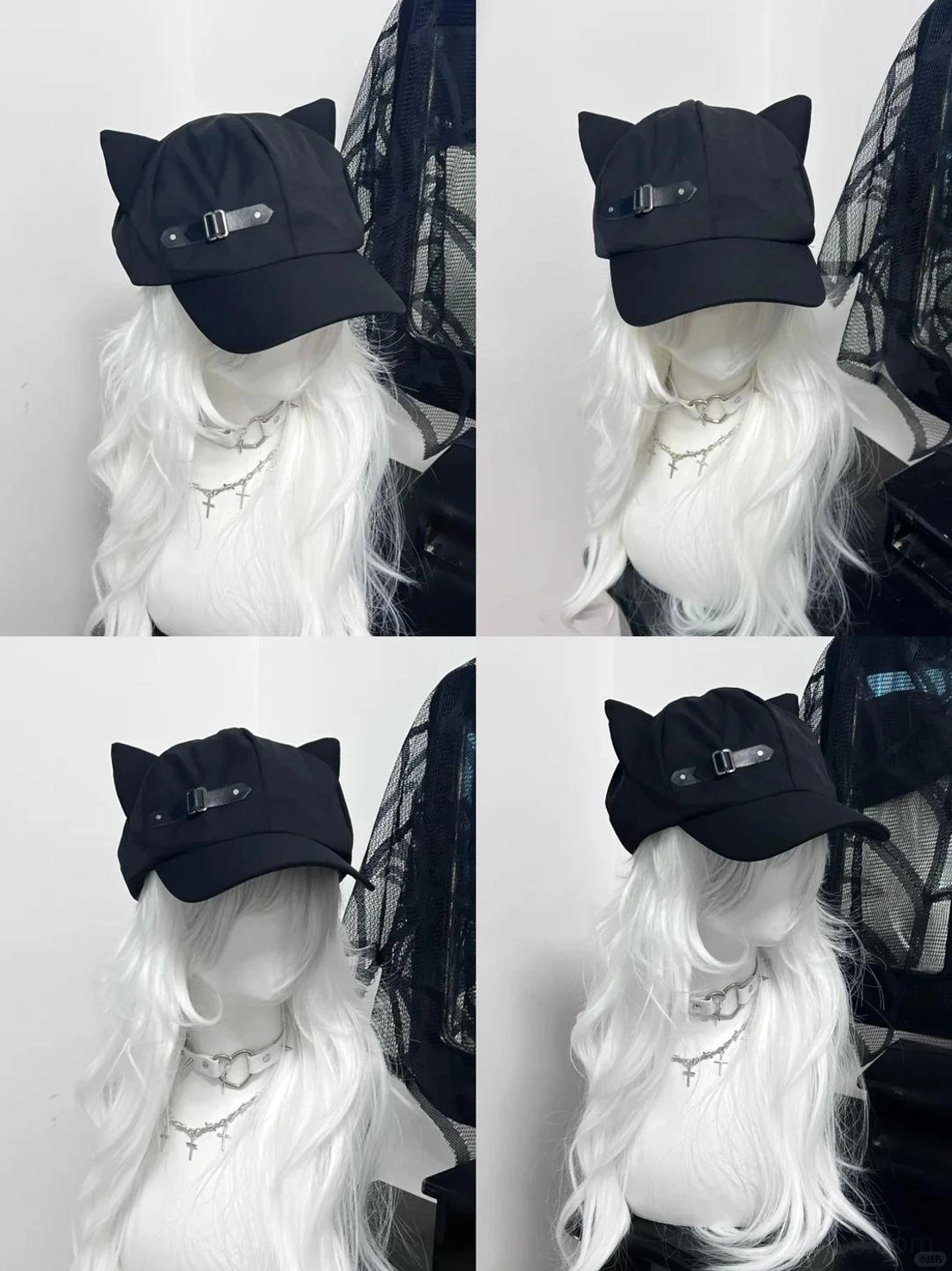 Black cat ear beret cap left side profile view, compact peaked design, leather buckle strap, white curly hair gothic mannequin, Jirai Kei aesthetic