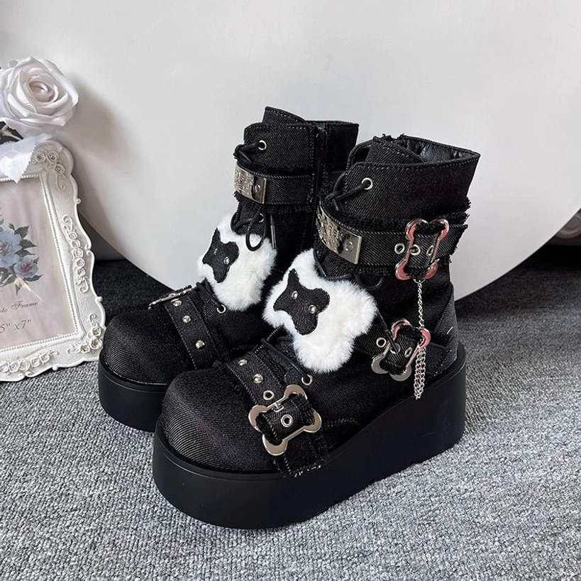 Black denim platform Martin boots with bone decorations, metal chains and rivets, showing lacing details, round platform toe - Jirai Kei punk aesthetic
