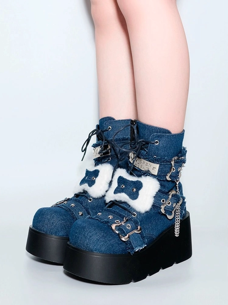 Black denim platform Martin boots storage presentation showing boot shapers and acid-free paper preservation method