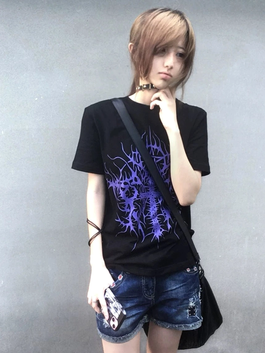 Black gothic cross print t-shirt paired with alternative fashion accessories, chain choker, and dark aesthetic styling inspiration for jirai kei