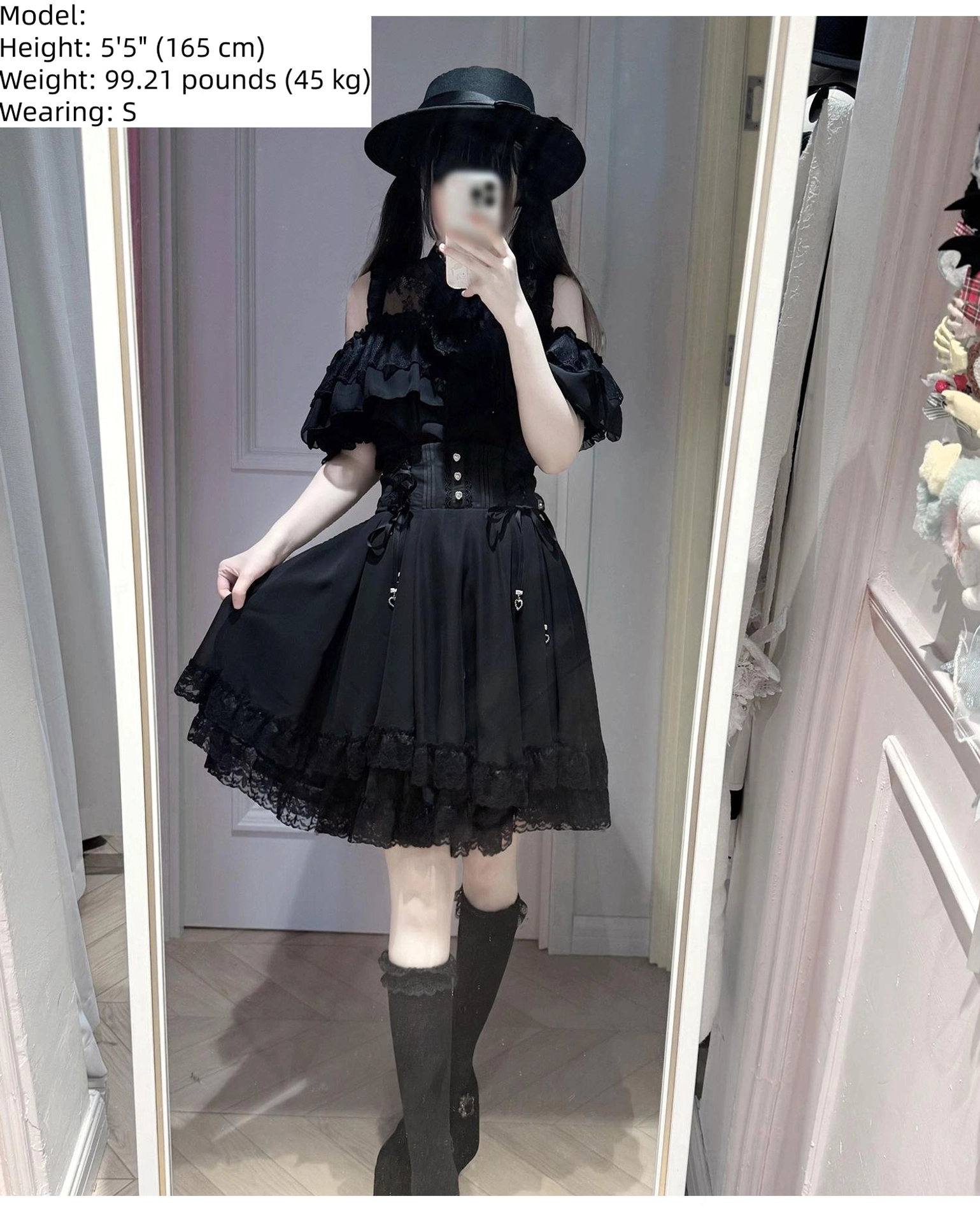 Black off-shoulder gothic Jirai Kei dress mirror selfie with knee-high boots corset waist and lace hem