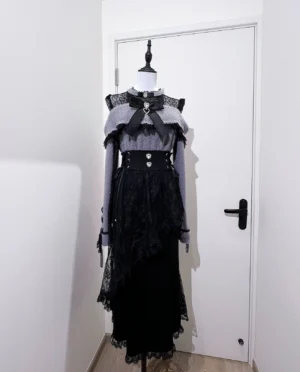 Black gothic mermaid skirt with lace veil showing metal buckle waistband and fishtail hem detail