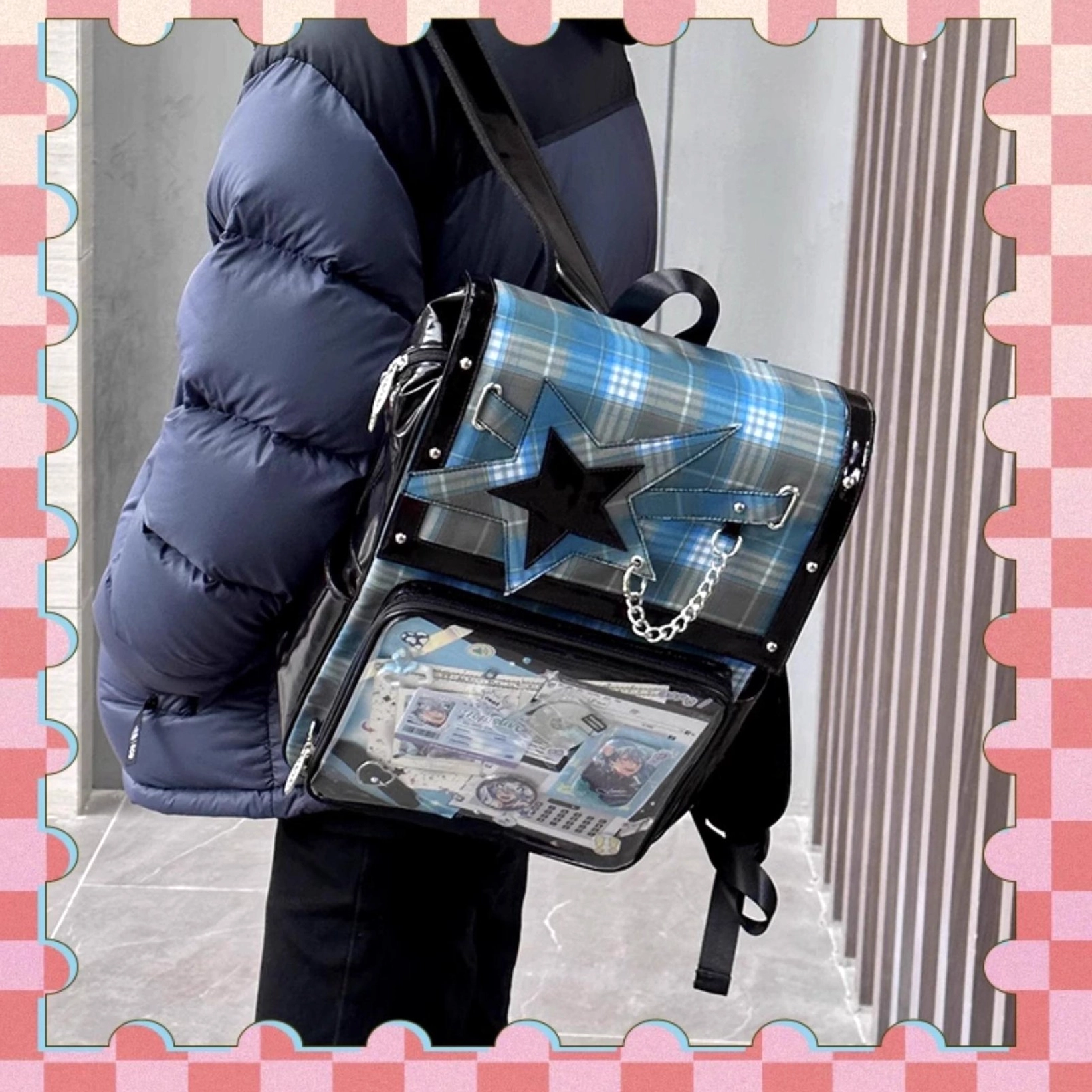 Black-grey tartan star ita backpack carrying position showing spacious capacity and badge arrangement