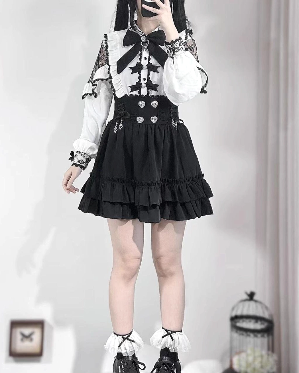 Complete black Jirai Kei outfit featuring A-line skirt with ruffled frill socks and platform combat boots, full front studio view showing coordinated subculture aesthetic with star pattern details