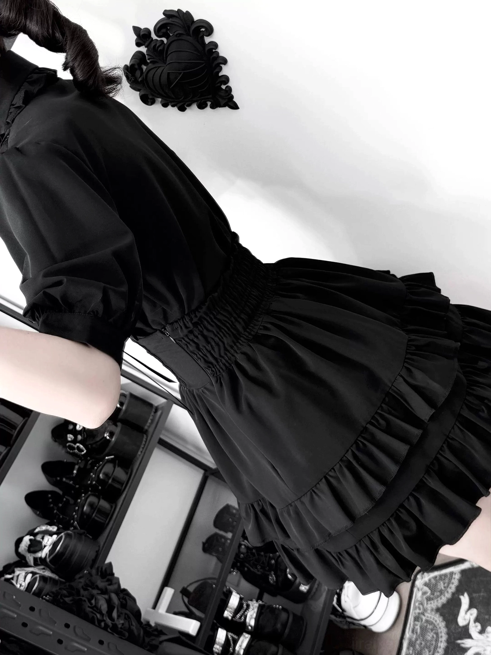 Jirai Kei black outfit set side view angle showing shirred elastic waist and tiered ruffled skirt silhouette