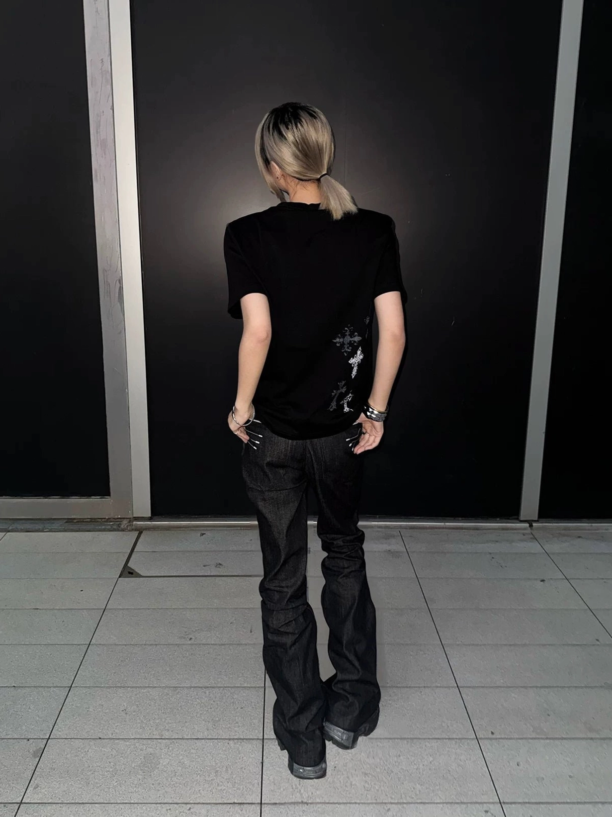 Black Jirai Kei t-shirt worn styled with alternative fashion accessories, demonstrating versatility for subculture aesthetic and layering options