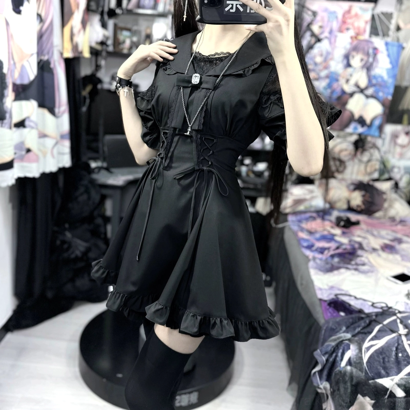 Black Jirai Kei dress with detachable bow ornament and adjustable lace-up waist styling option