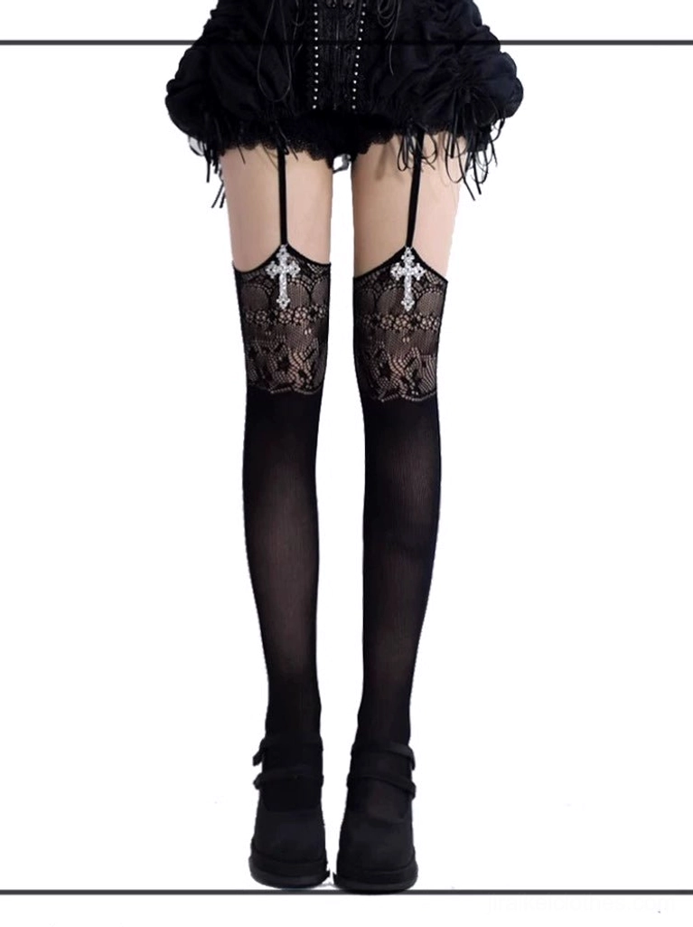 Black gothic jirai kei garter thigh-high stockings with silver cross pendant and floral lace cutout, front view paired with black feathered skirt and platform shoes