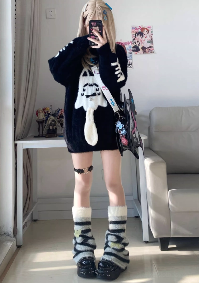 Black Jirai Kei ghost cat mink fabric sweater texture close-up showing plush material quality and embroidery details