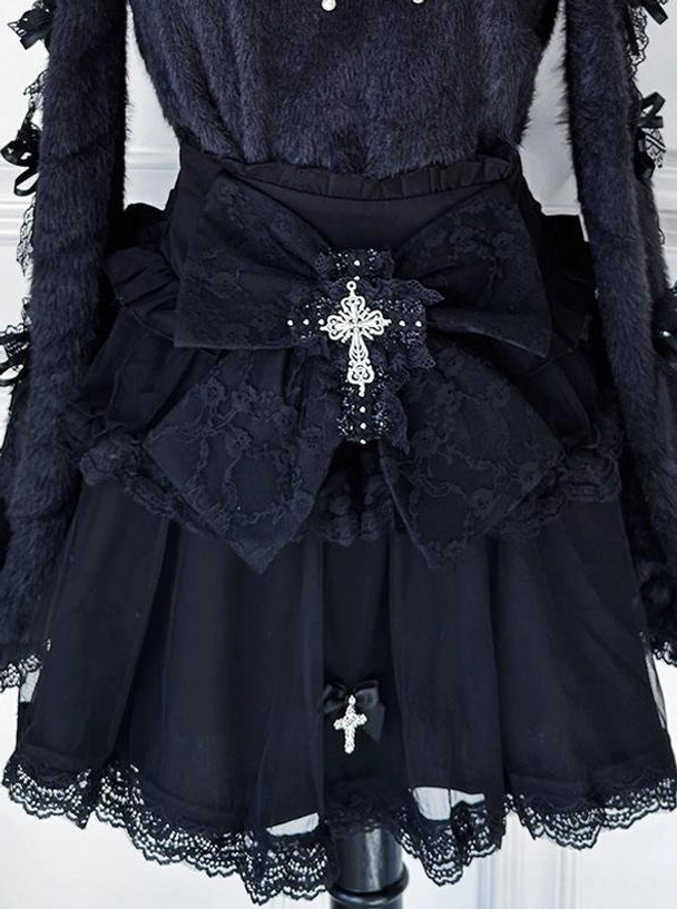 Black high-waist Jirai Kei cross-detail mini skirt flat display showing layered tulle construction, elastic waistband, and cross accent embellishments for gothic lolita styling