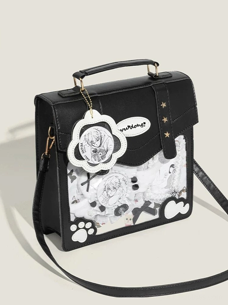 black crossbody jirai kei ita bag leather texture detachable shoulder strap flower charm studio background
