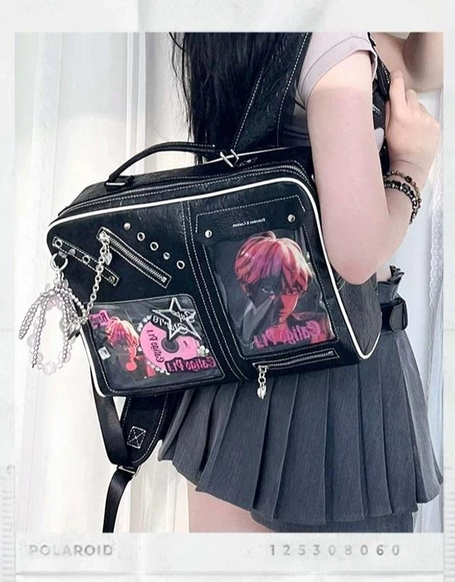 Black Jirai Kei ita backpack with clear anime character display windows and rivet decorations shown on model