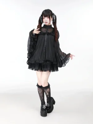 Black Jirai Kei jumper dress with hime-sleeved sheer blouse front view studio shot showing square neckline and ruffled bishop sleeves