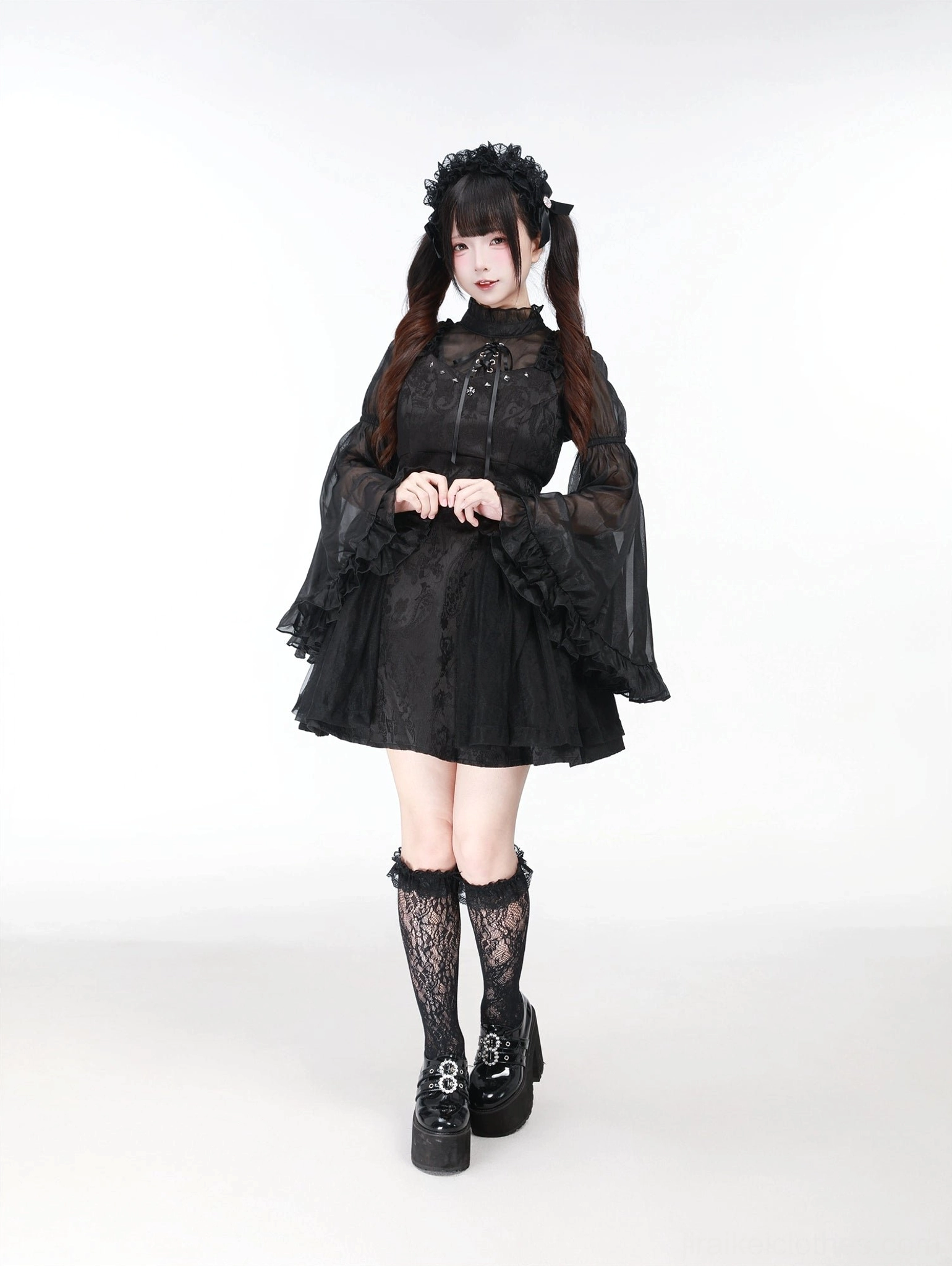 Black Jirai Kei two-piece set full standing view textured jacquard dress with stud accents and sheer ruffled flare sleeves