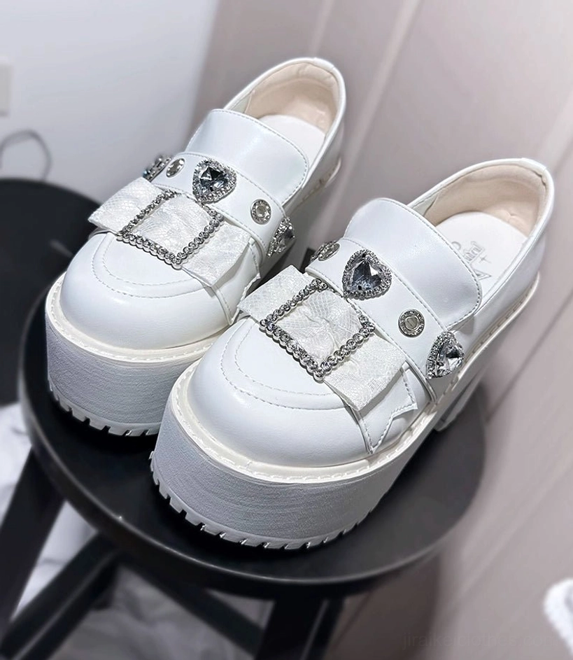 Black Jirai Kei platform loafers paired with character-themed accessories and styling elements