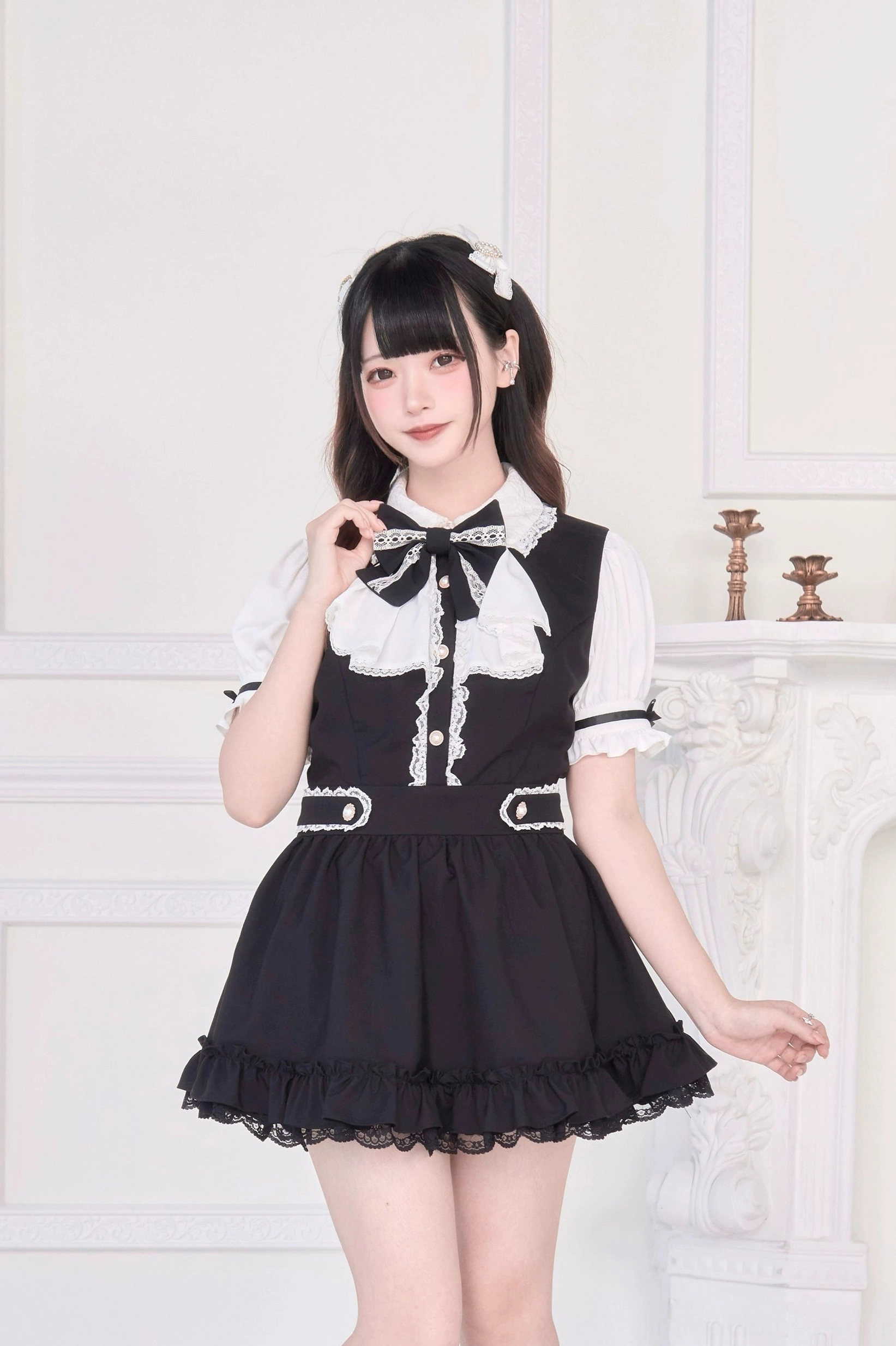 Black Jirai Kei maid dress with detachable bow tie full-body front view model platform shoes indoor setting