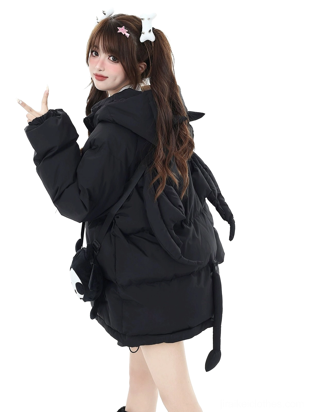 Black Jirai Kei oversized puffer coat with detachable devil crossbody bag showing bag design skull embellishment and attachment method