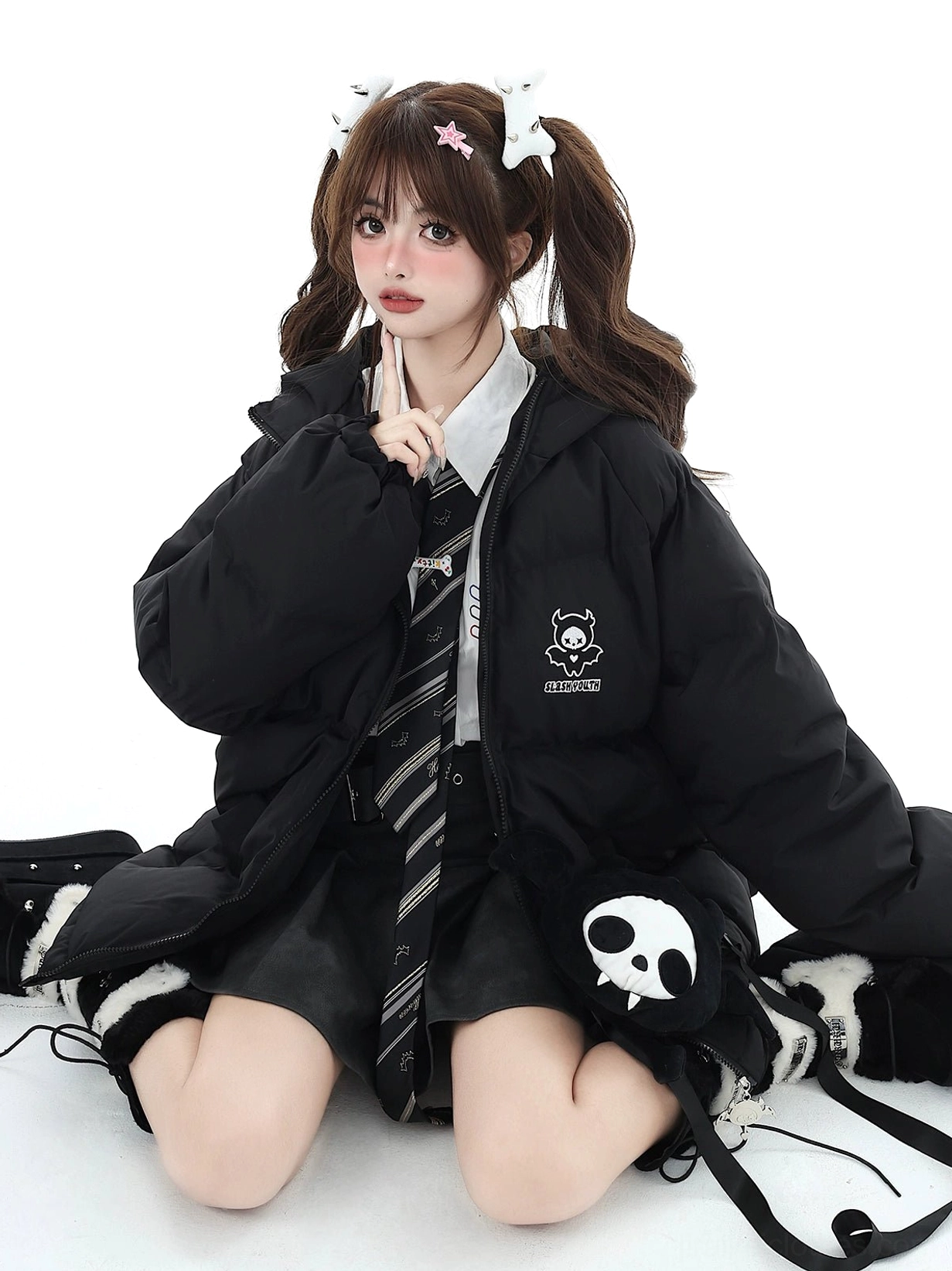 Black Jirai Kei oversized winter coat layering examples with different outfits and styling combinations for various occasions