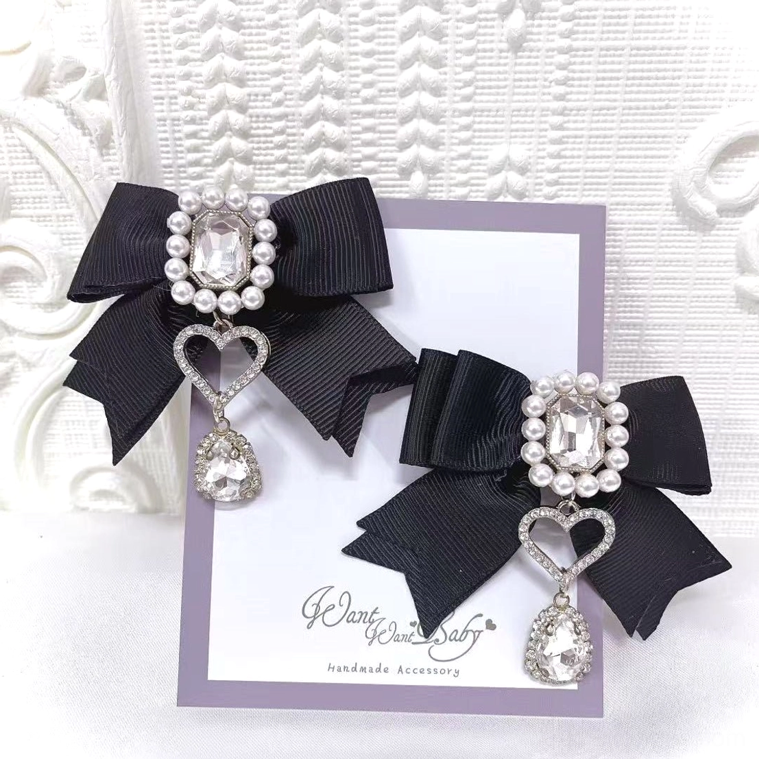 Black Jirai Kei pearl rhinestone bow hair clips carded display with silver rhinestone pearl center and crystal teardrop charm detail