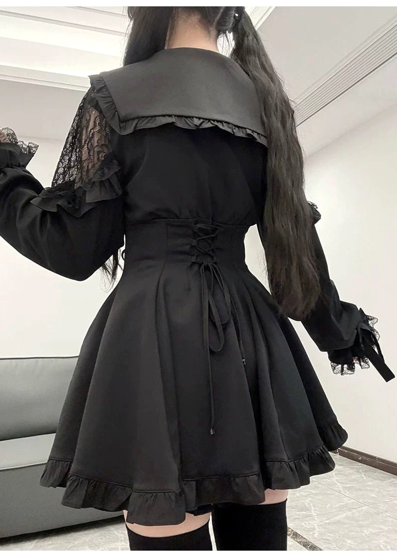 Back view of black Jirai Kei sailor dress with corset drawstring and ruffled lace hem on model