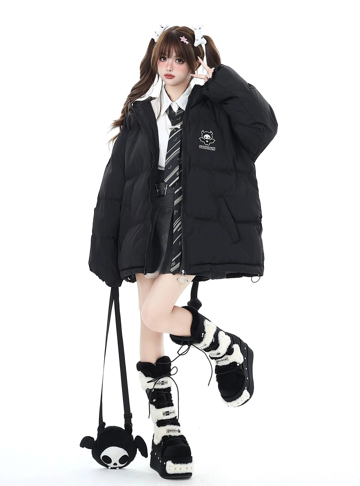 Black Jirai Kei winter cotton coat dynamic side full body view with detachable devil crossbody bag chest logo loose sleeves on school uniform