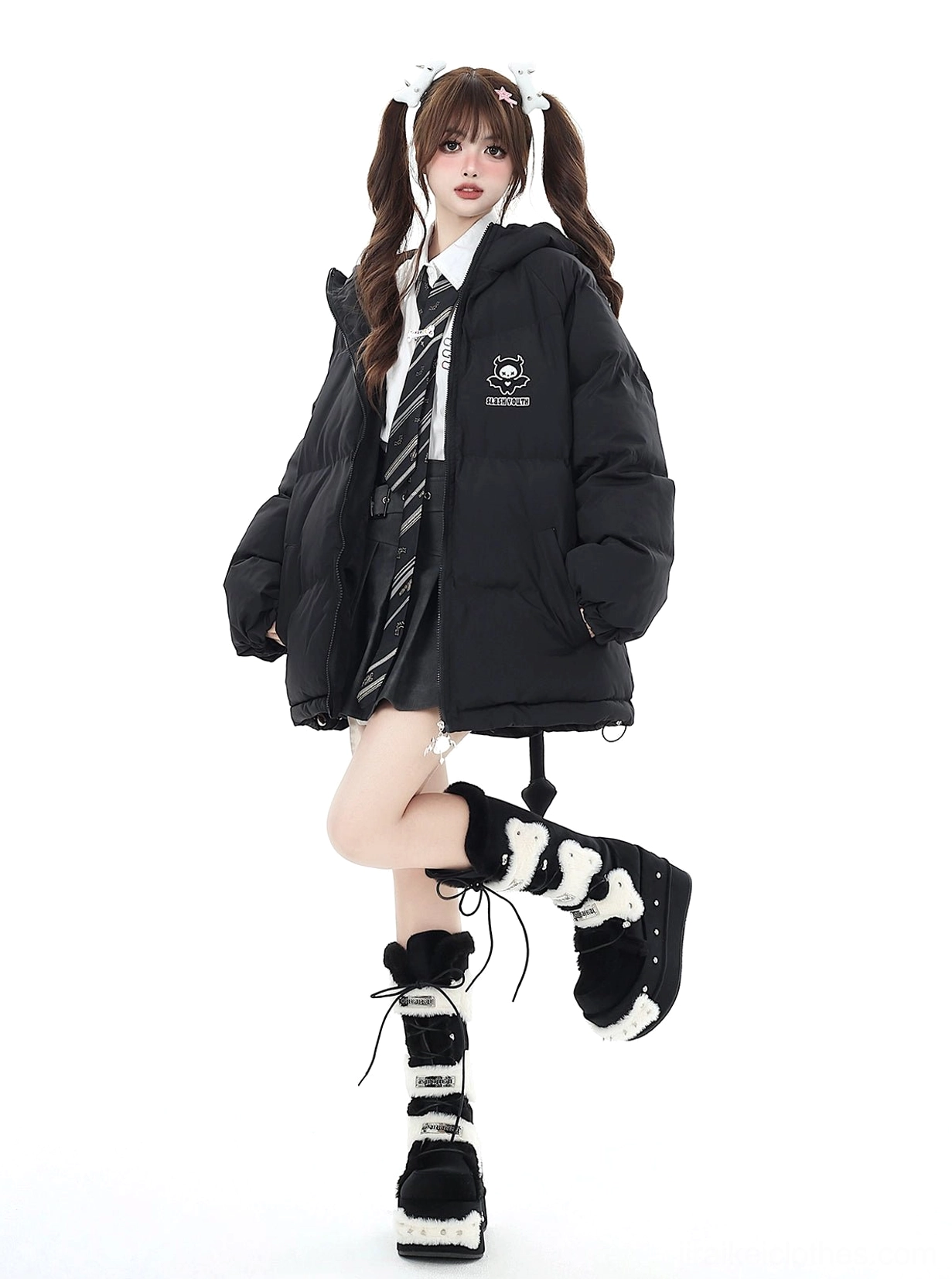 Black Jirai Kei winter puffer coat showing fabric texture and quilted construction details oversized silhouette with hood