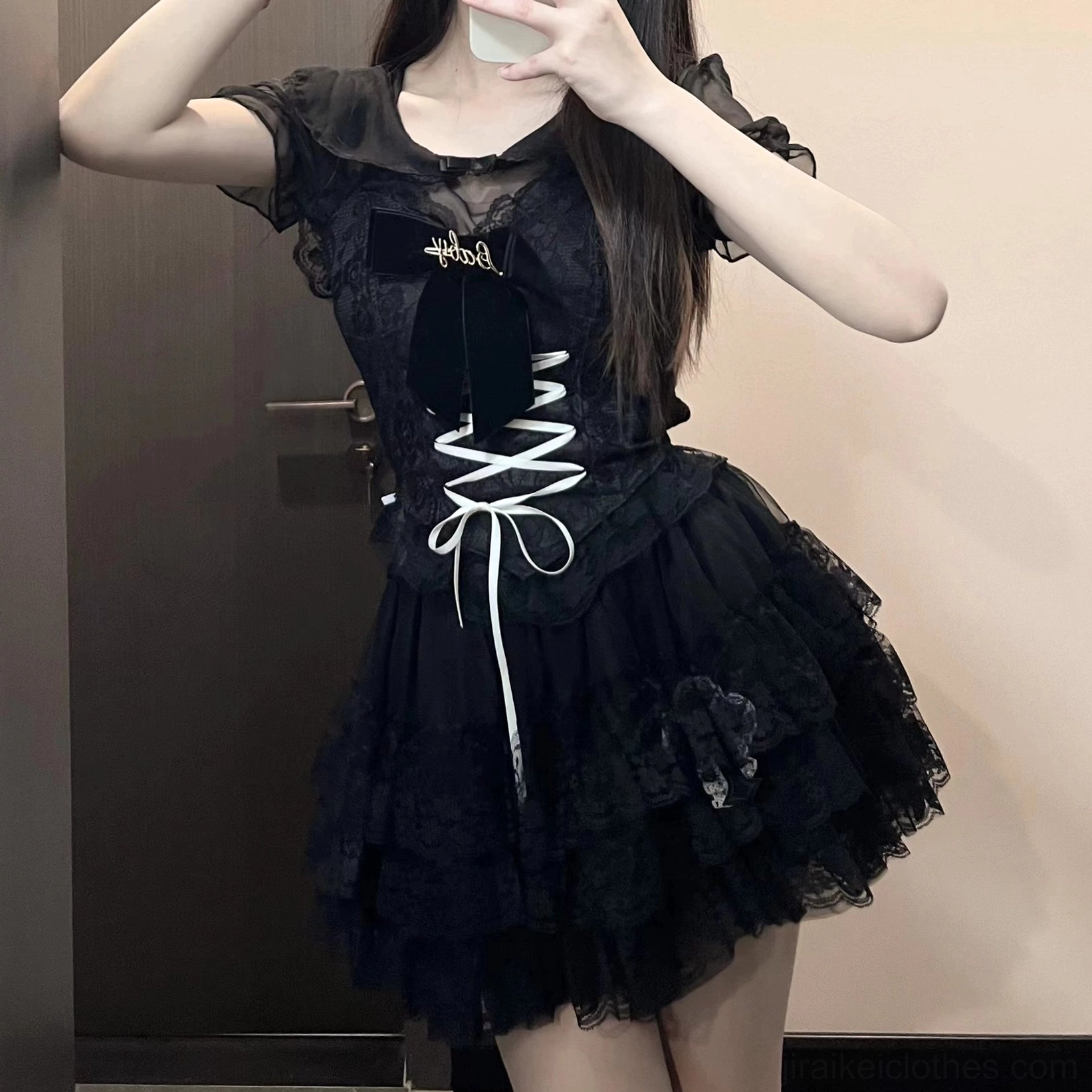 Jirai Kei black Y2K lace outfit front view featuring sheer mesh bust corset waist lace-up and tiered ruffle mini skirt