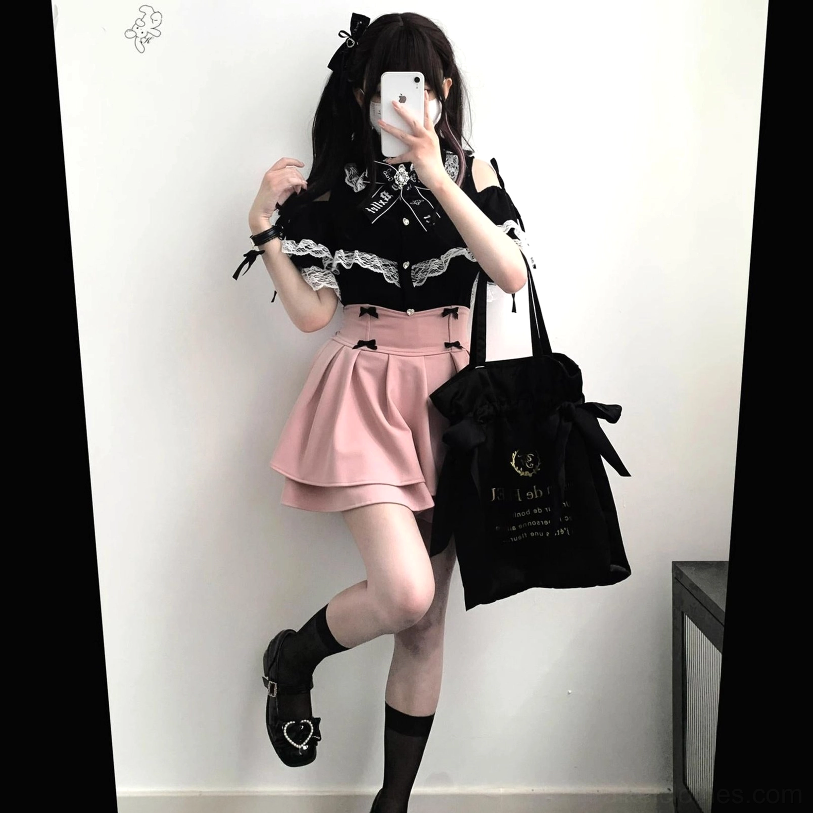 Black lace off-shoulder Jirai Kei blouse with adjustable straps paired with pink mini skirt side view mirror selfie