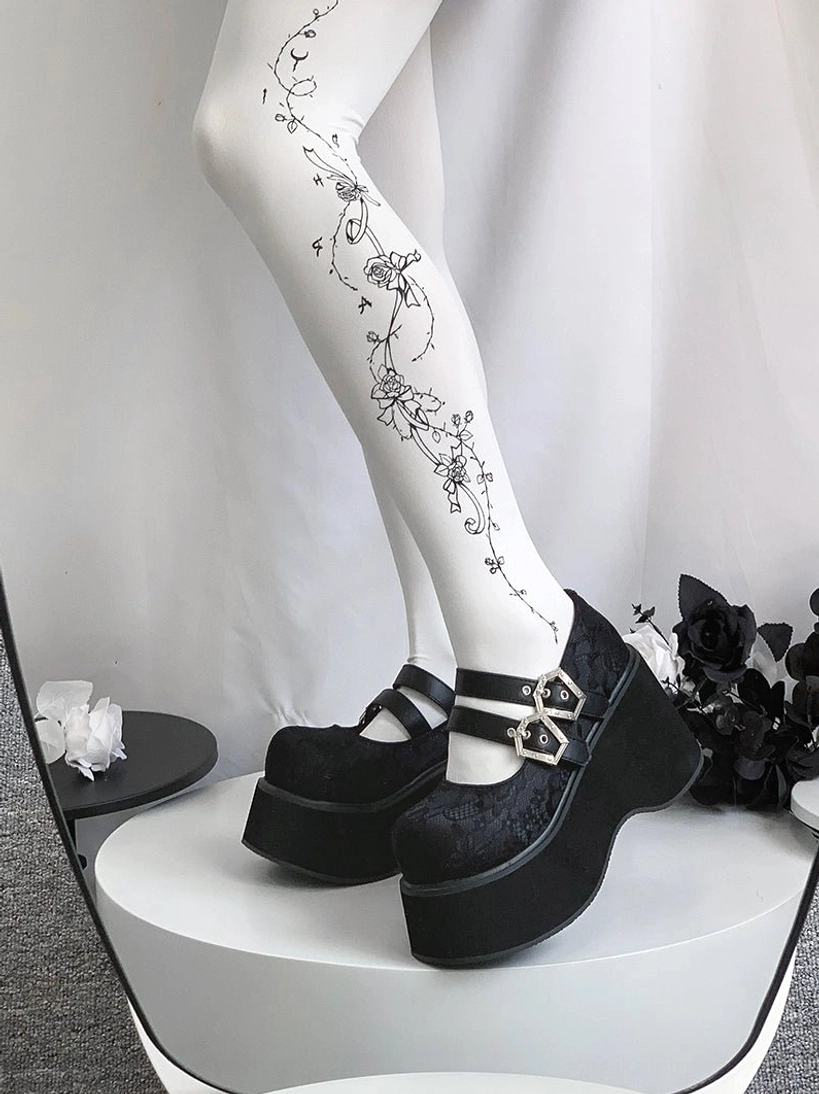 Black leather Mary Jane platform shoes round toe silhouette with dual decorative buckles thick platform sole and gothic aesthetic styling