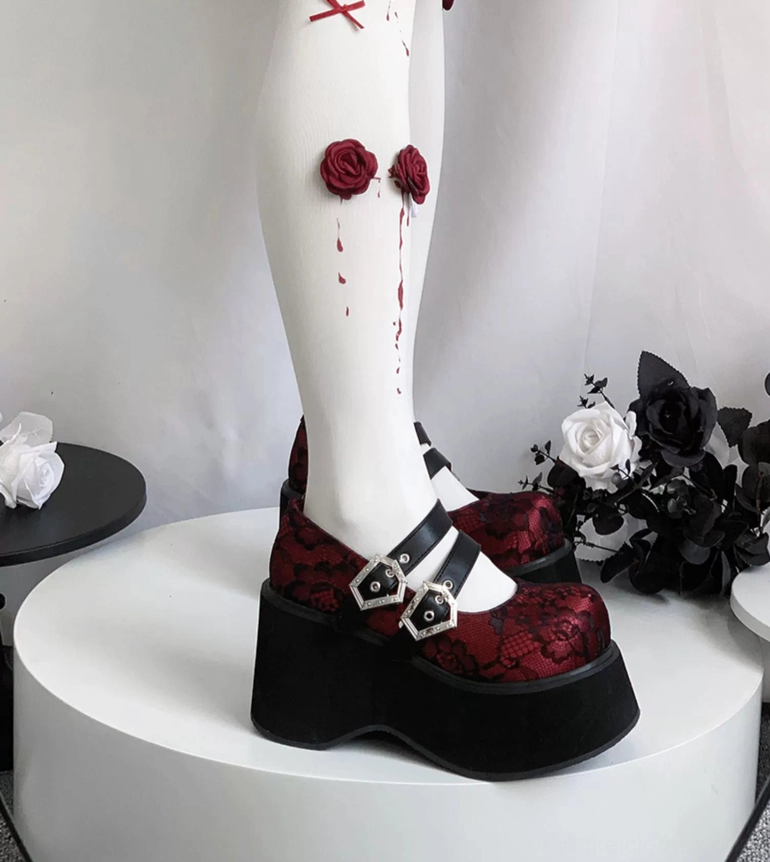 Mary Jane platform shoes black leather upper with dual decorative silver hexagonal buckles showing gothic aesthetic and platform height comparison