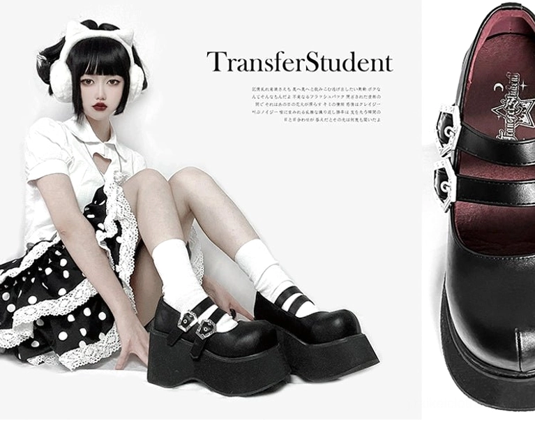 Black leather Mary Jane platform shoes front facing view showing round toe silhouette dual silver buckles and thick platform height